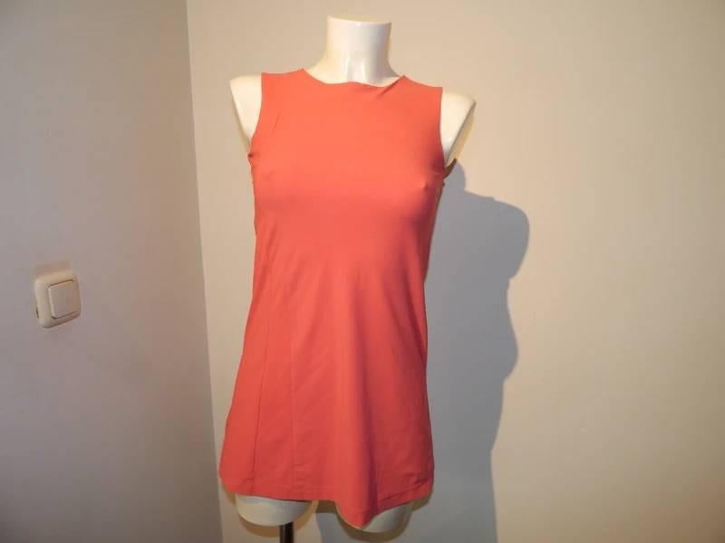 Ladress koraal kleurige stretch top iets langer model XS, Kleding | Dames, Tops, Zo goed als nieuw, Maat 34 (XS) of kleiner, Overige kleuren