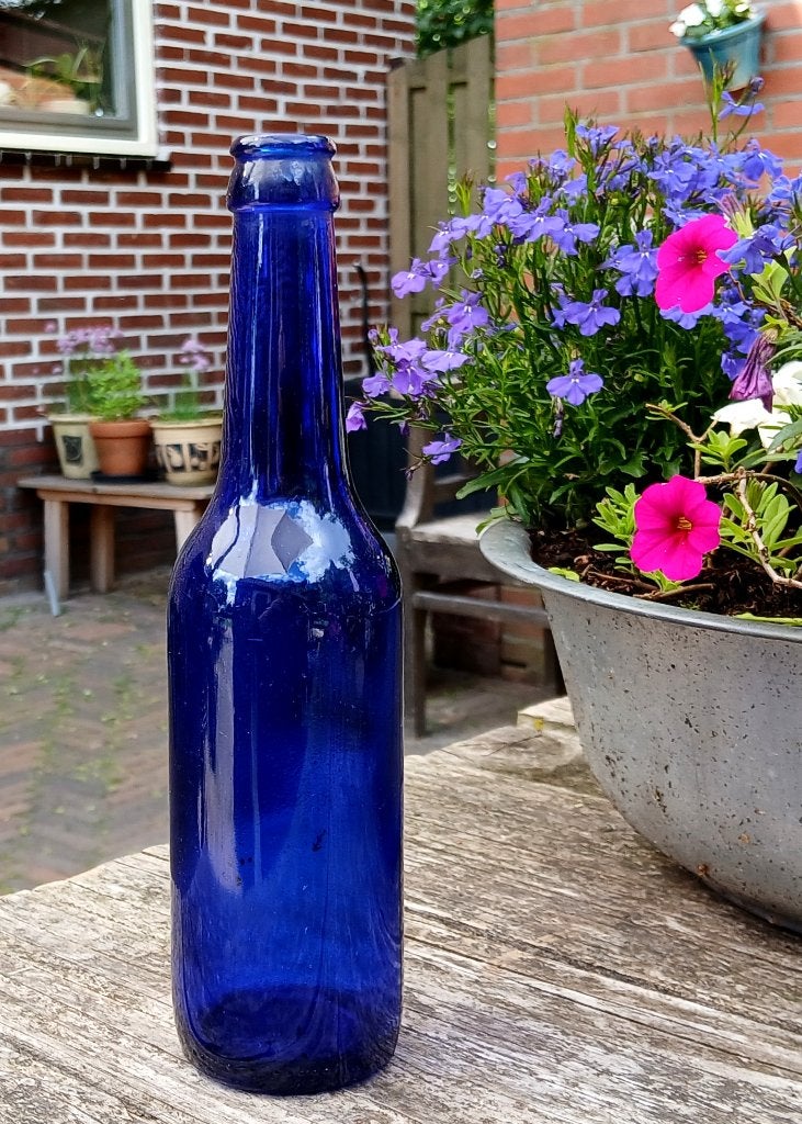 Flesje van blauw glas - kobaltblauw, Antiek en Kunst, Ophalen of Verzenden