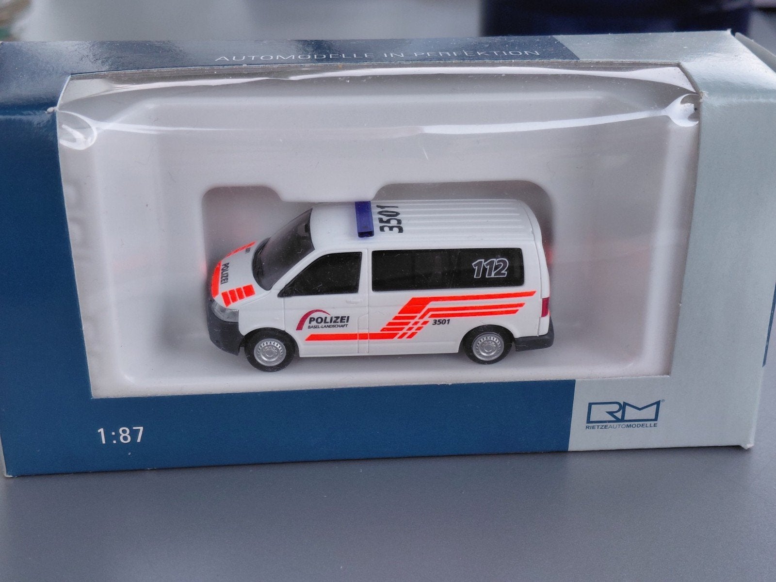 Rietze VW Volkswagen Transporter T5 Polizei (CH) modelauto, Ophalen of Verzenden, Nieuw, Auto, Rietze