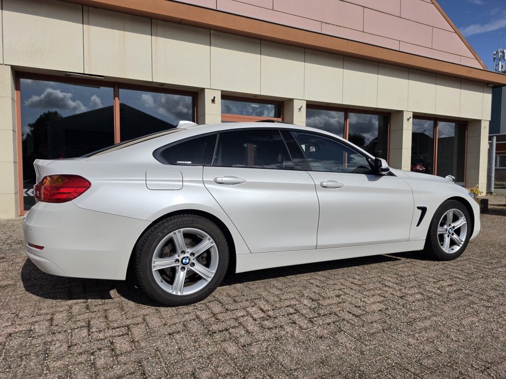 BMW 4 Serie Gran Coupé 418i Centennial Executive | Xenon |, Auto's, Keurmerk '100% Onderhouden', 12 maanden, Gebruikt, Euro 6
