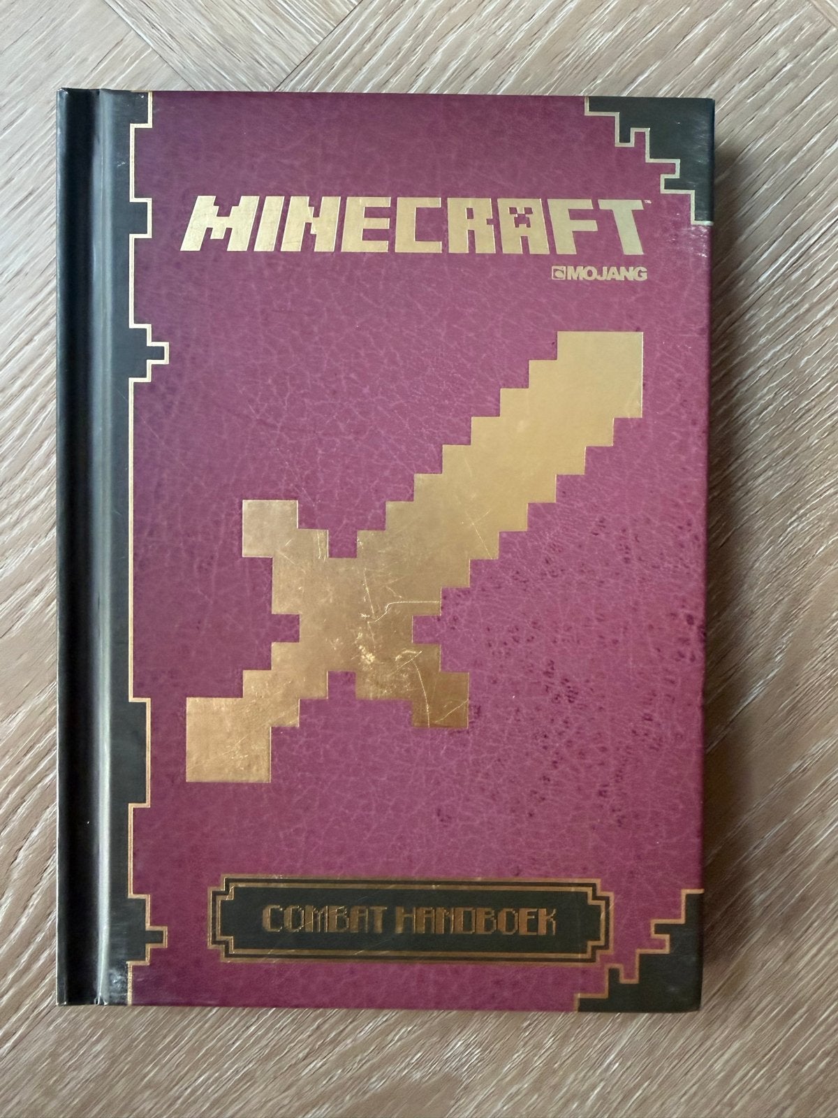 Minecraft Combat Handboek - Leer vechten en overleven, Ophalen of Verzenden, Zo goed als nieuw, Non-fictie