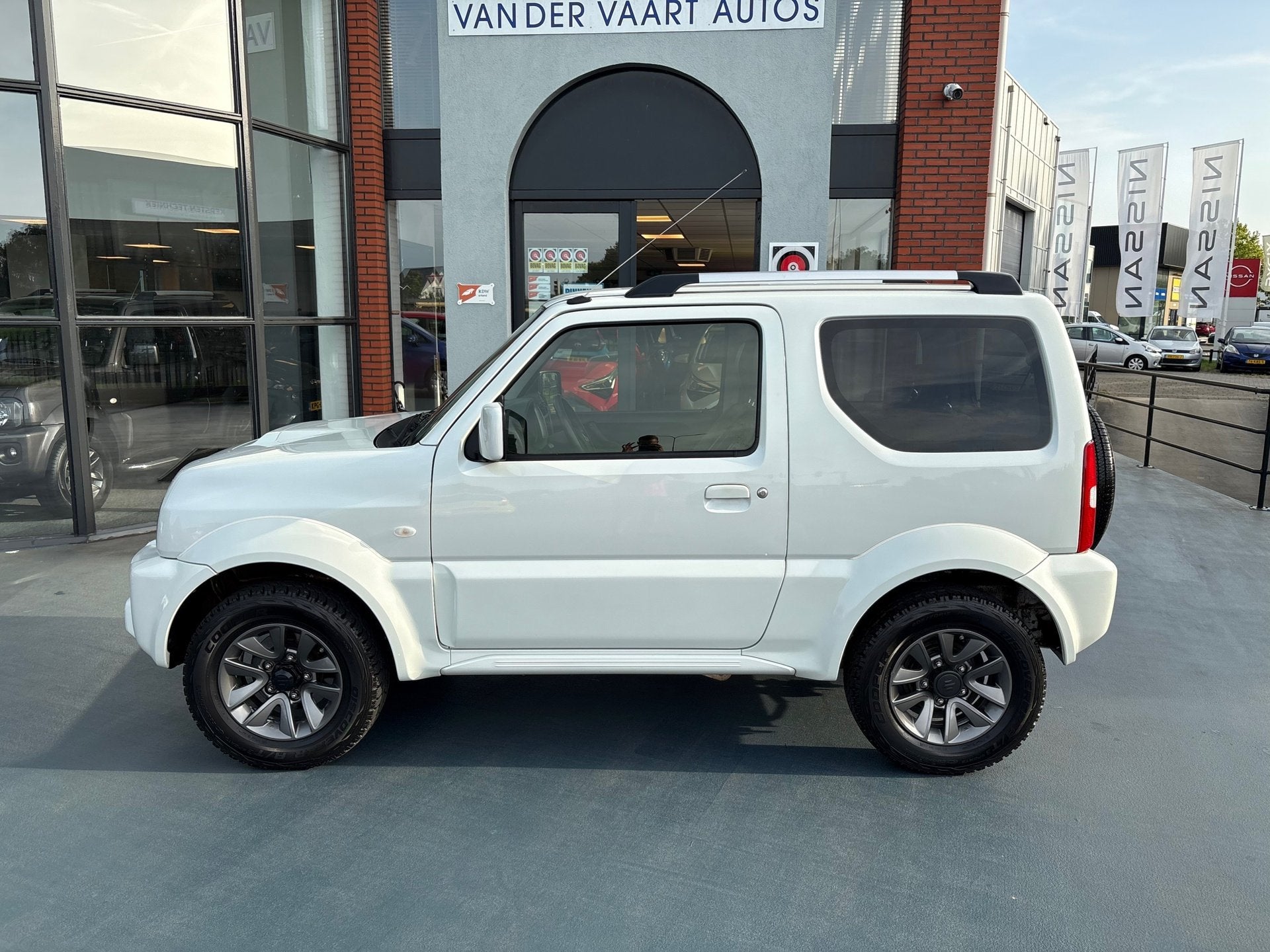 Suzuki JIMNY 1.3 Exclusive LEDER STOELVERWARMING AIRCO LMV, Auto's, Dealer onderhouden, Gebruikt, Euro 6, 4 stoelen