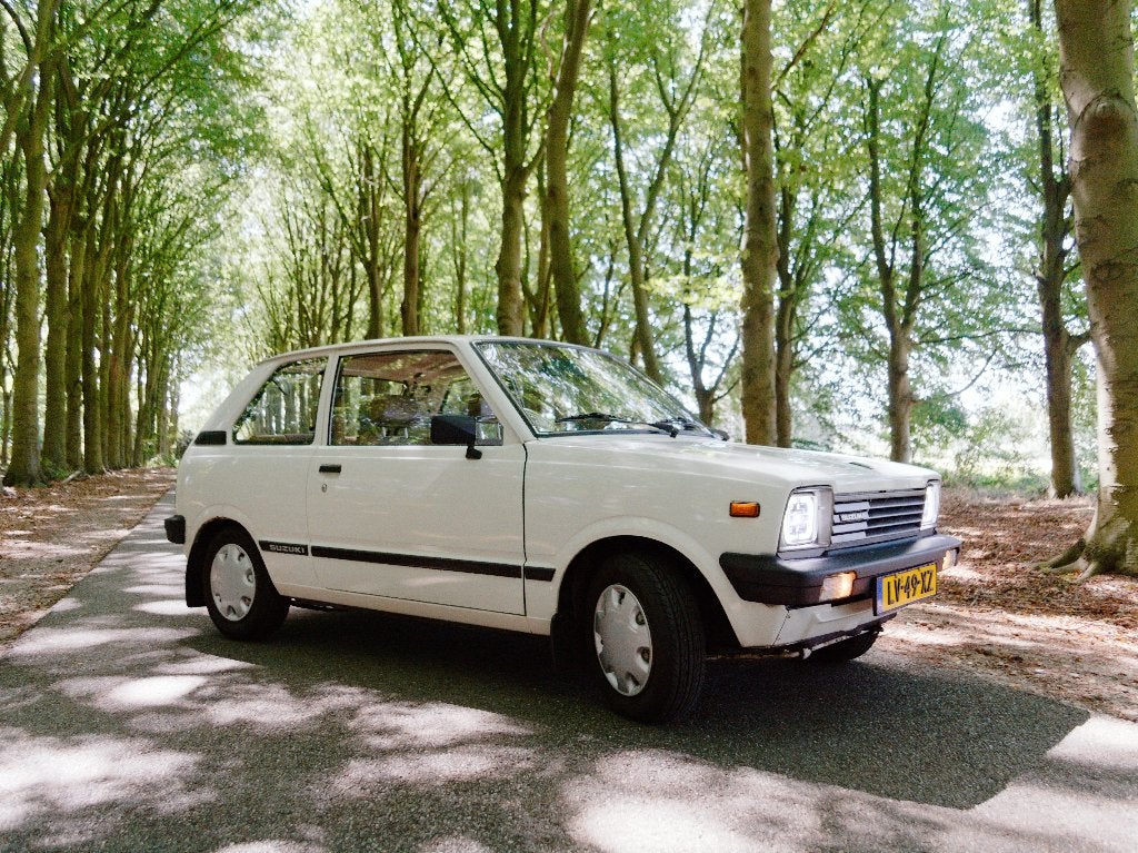 Suzuki Alto 0.8 1985 Wit, Auto's, Voorwielaandrijving, Stof, 40 pk, Koplamp volledig LED