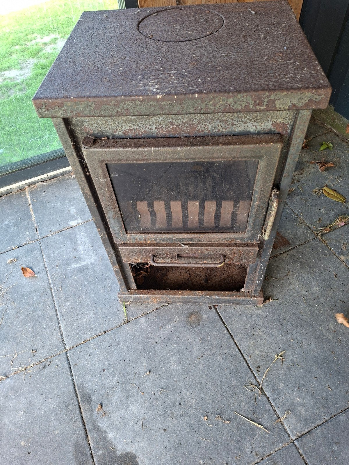 Oude houtkachel - opknapper, Ophalen