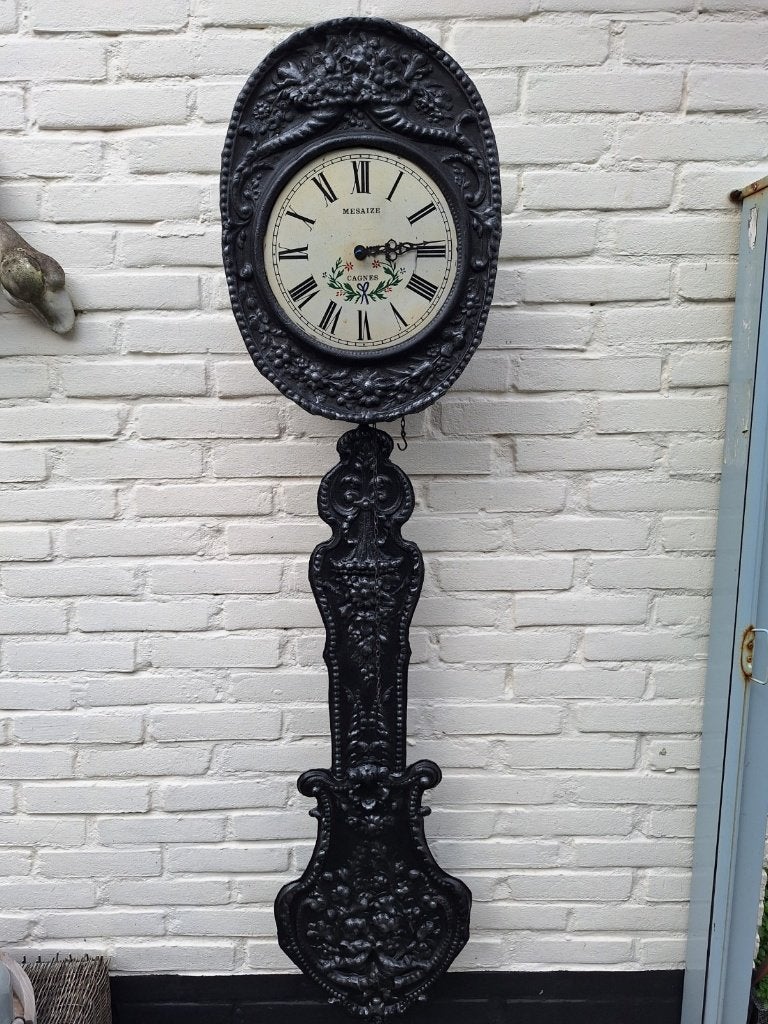Antieke gietijzeren wandklok - decoratief, Antiek en Kunst, Antiek | Klokken, Ophalen