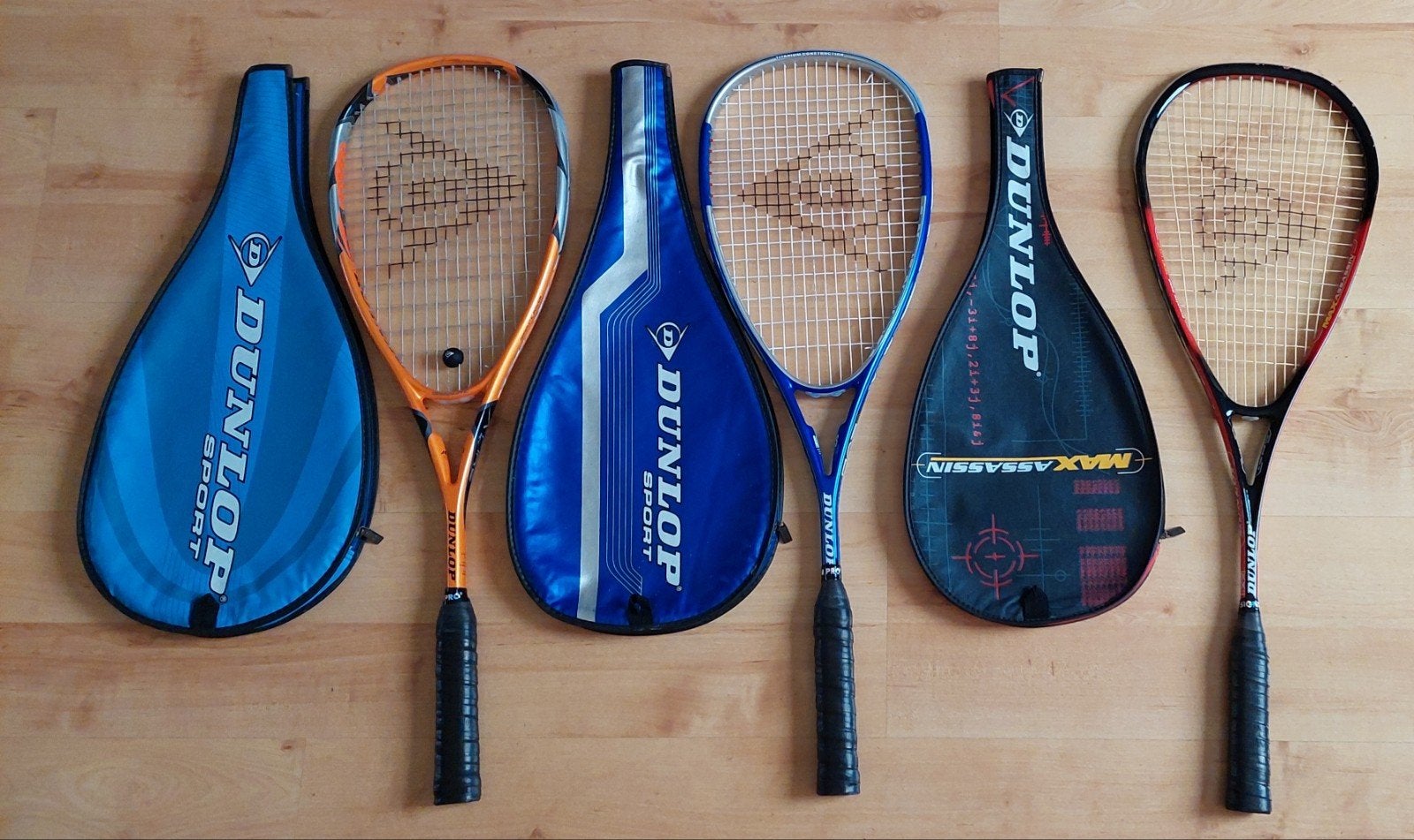 Dunlop Squashrackets met beschermhoes, Sport en Fitness, Squash, Ophalen of Verzenden, Zo goed als nieuw, Racket, Met hoes