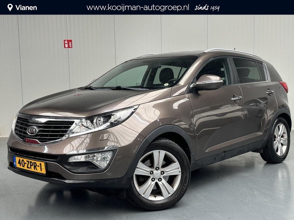 Kia Sportage 2.0 X-clusive AUTOMAAT Nette auto, goed onderho, 4 cilinders, Bruin, 163 pk, 1600 kg
