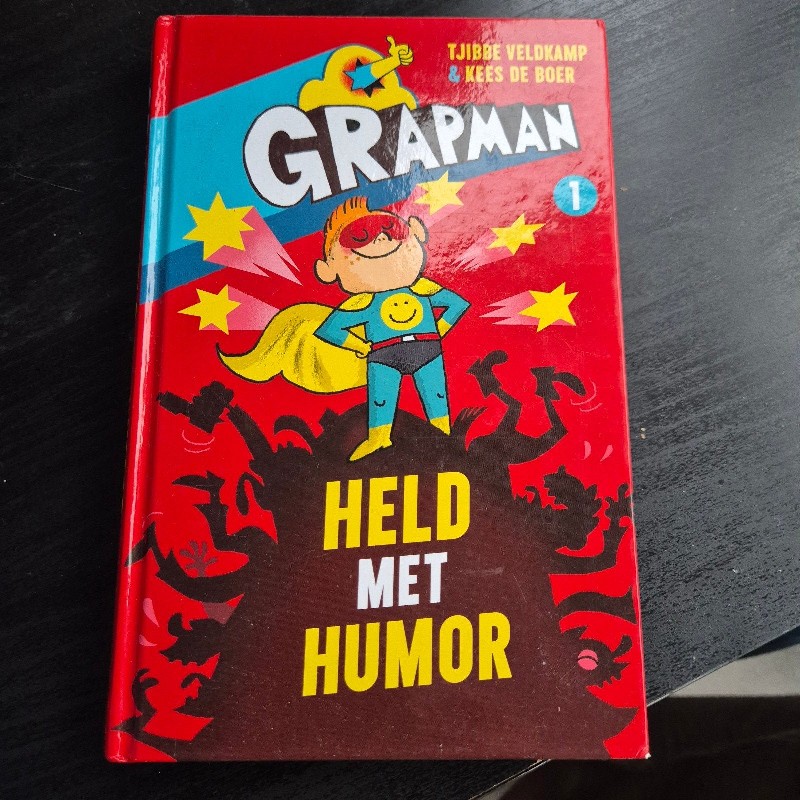 Grapman: Held met Humor - Tjibbe Veldkamp & Kees de Boer, Boeken, Ophalen of Verzenden, Zo goed als nieuw, Tjibbe Veldkamp & Kees de Boer