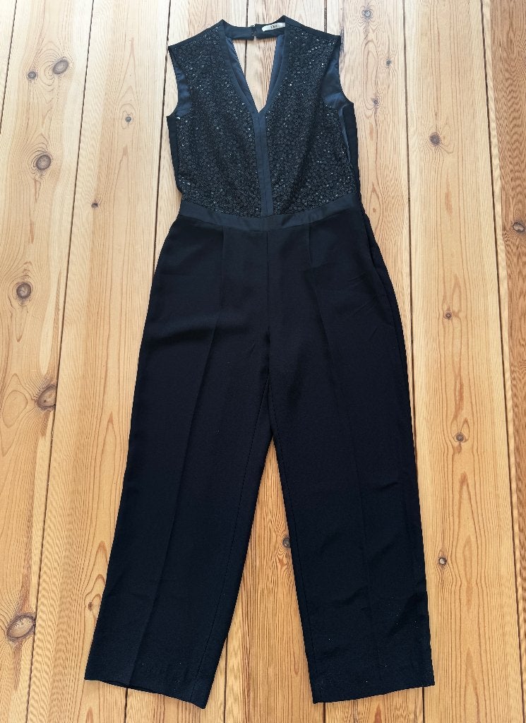 Jumpsuit Steps - Zwart met pailletten - Maat 40 (Medium), Maat 38/40 (M), Zwart, Ophalen of Verzenden, Zo goed als nieuw