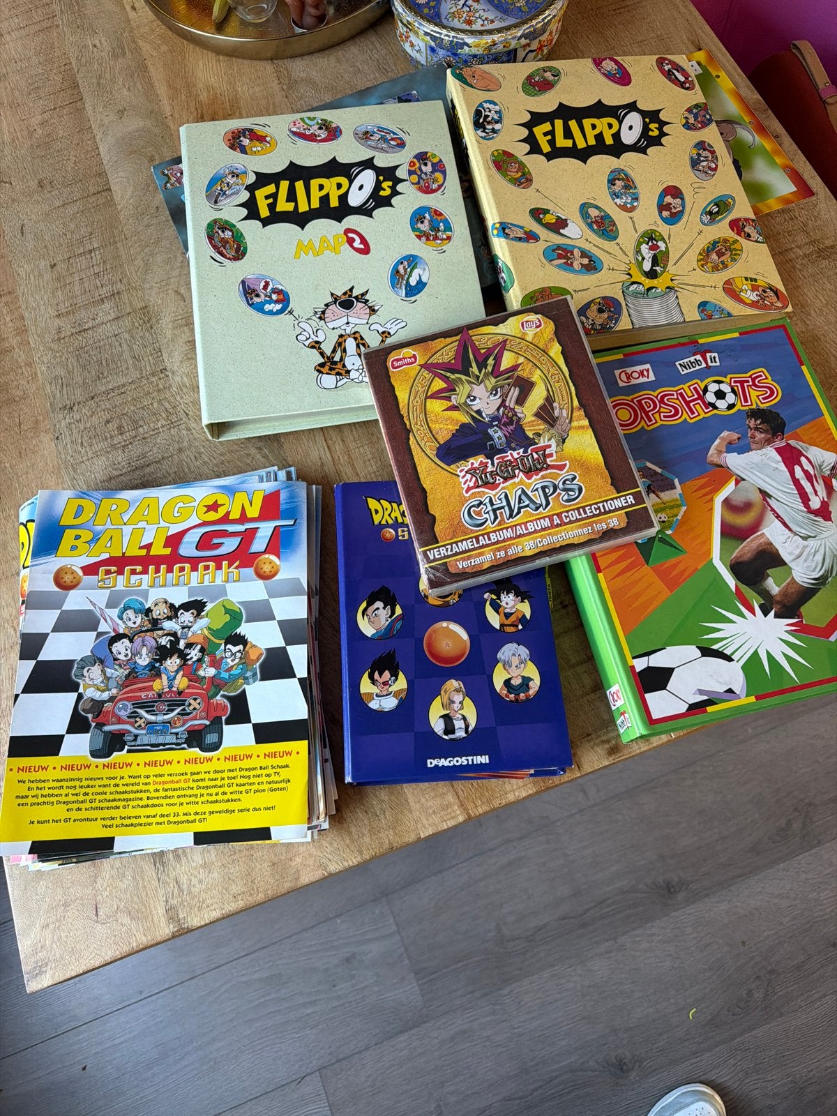 Grote verzameling Flippo's, Dragon Ball GT, Yu-Gi-Oh & Topsh, Ophalen of Verzenden, Looney Tunes, Verzameling, Met verzamelmap(pen)