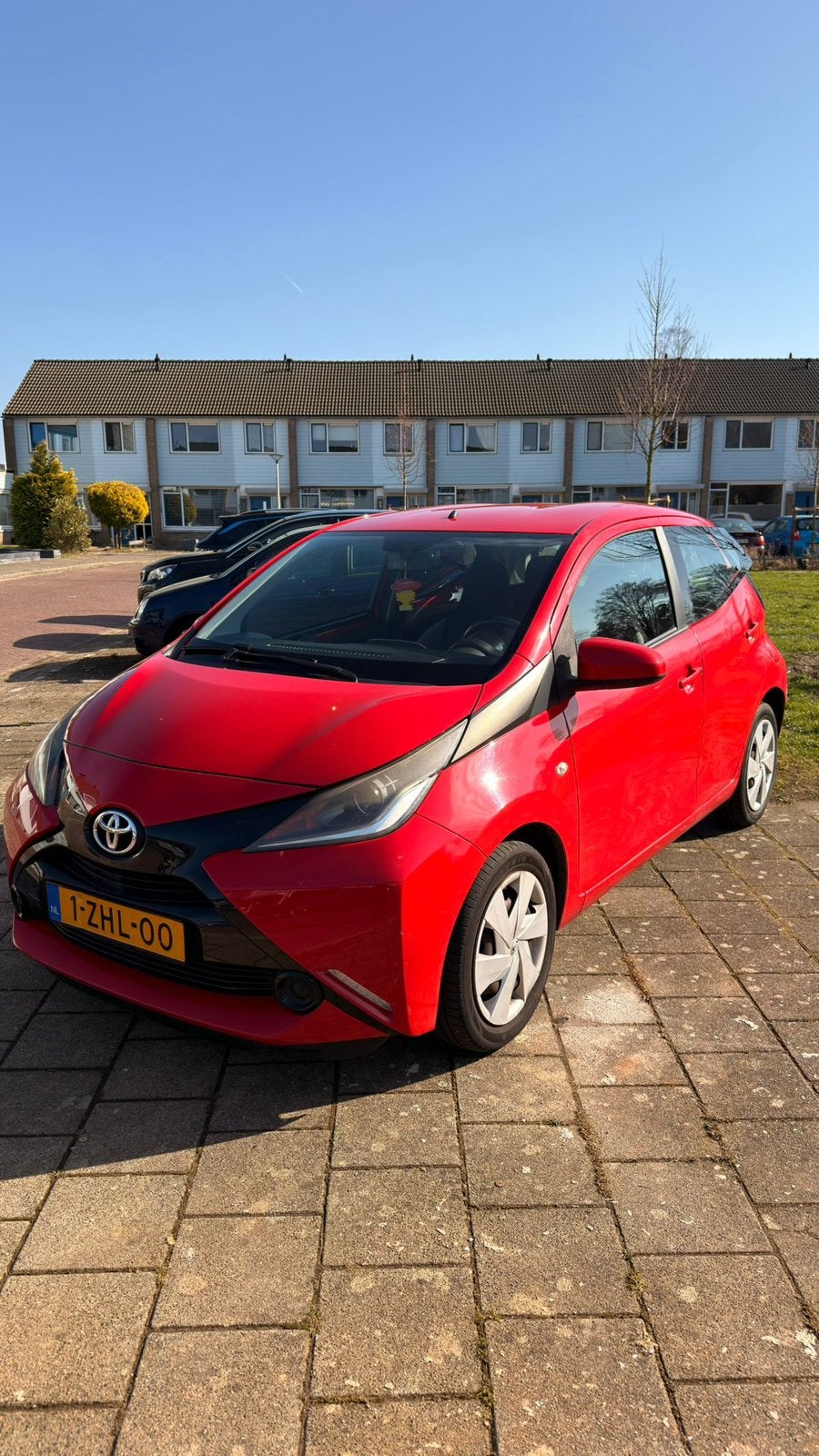 Toyota Aygo 1.0 12V Vvt-i Ddrs 2015 Rood, Auto's, Toyota, Voorwielaandrijving, Stof, 4 stoelen, Origineel Nederlands