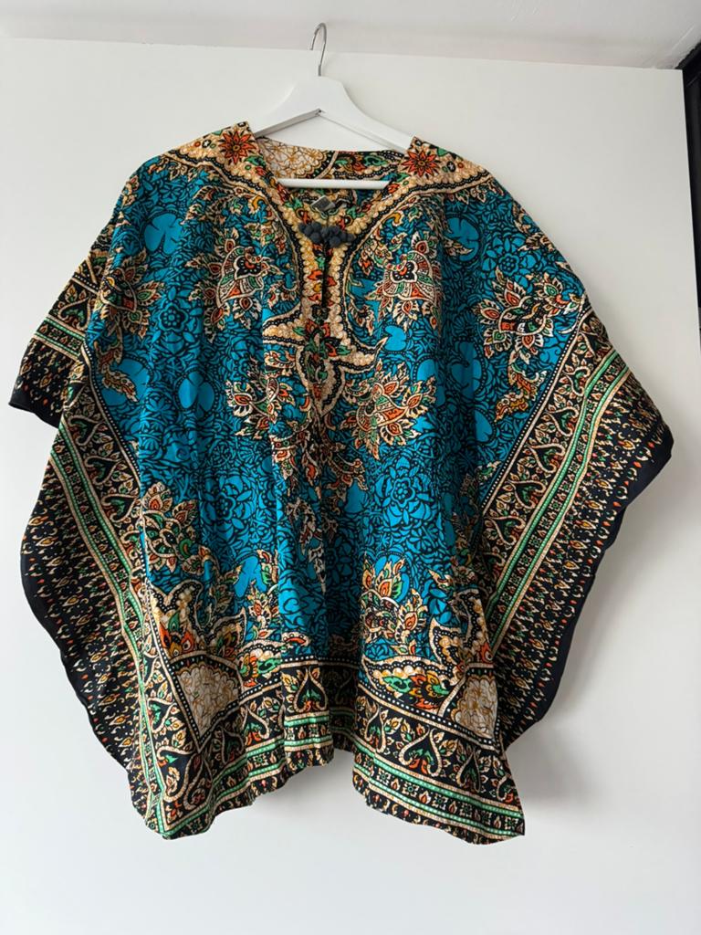 Poncho dames, Ophalen of Verzenden, Zo goed als nieuw, Boven de knie