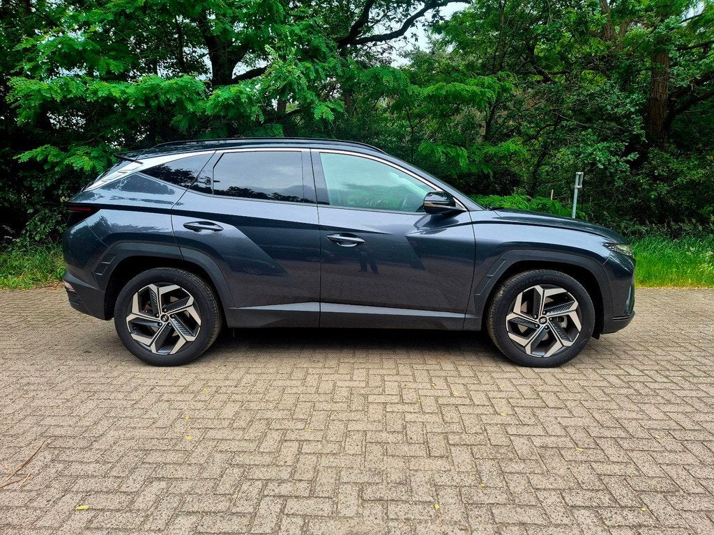 Hyundai Tucson 1.6 T-GDI HEV Comfort 230 pk / camera, Stof, Gebruikt, 4 cilinders, 1650 kg
