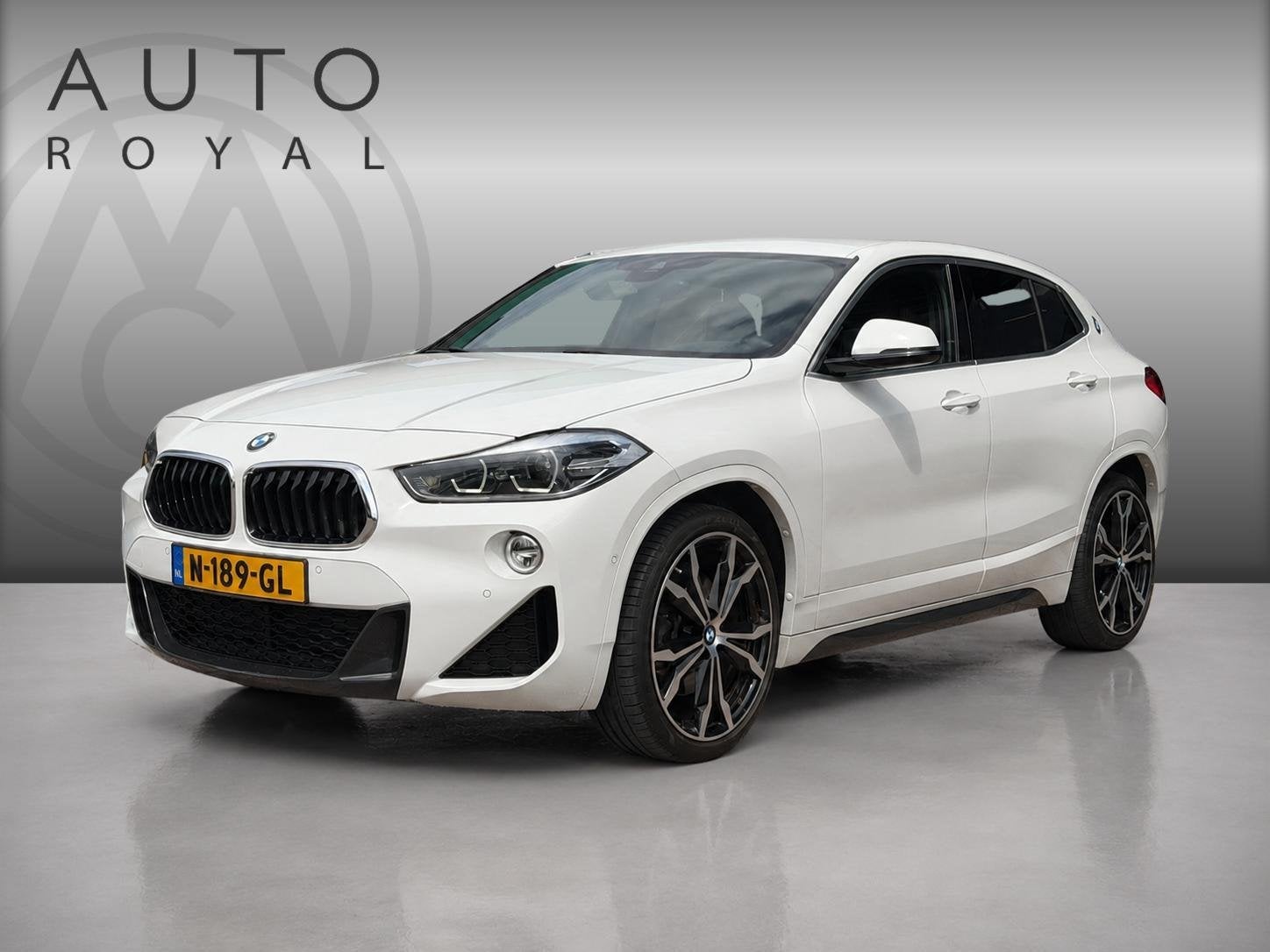 BMW X2 sDrive20i High Executive AUTOMAAT | LEDER | DODEHOEK, Auto's, 1998 cc, X2, 1435 kg, Wit