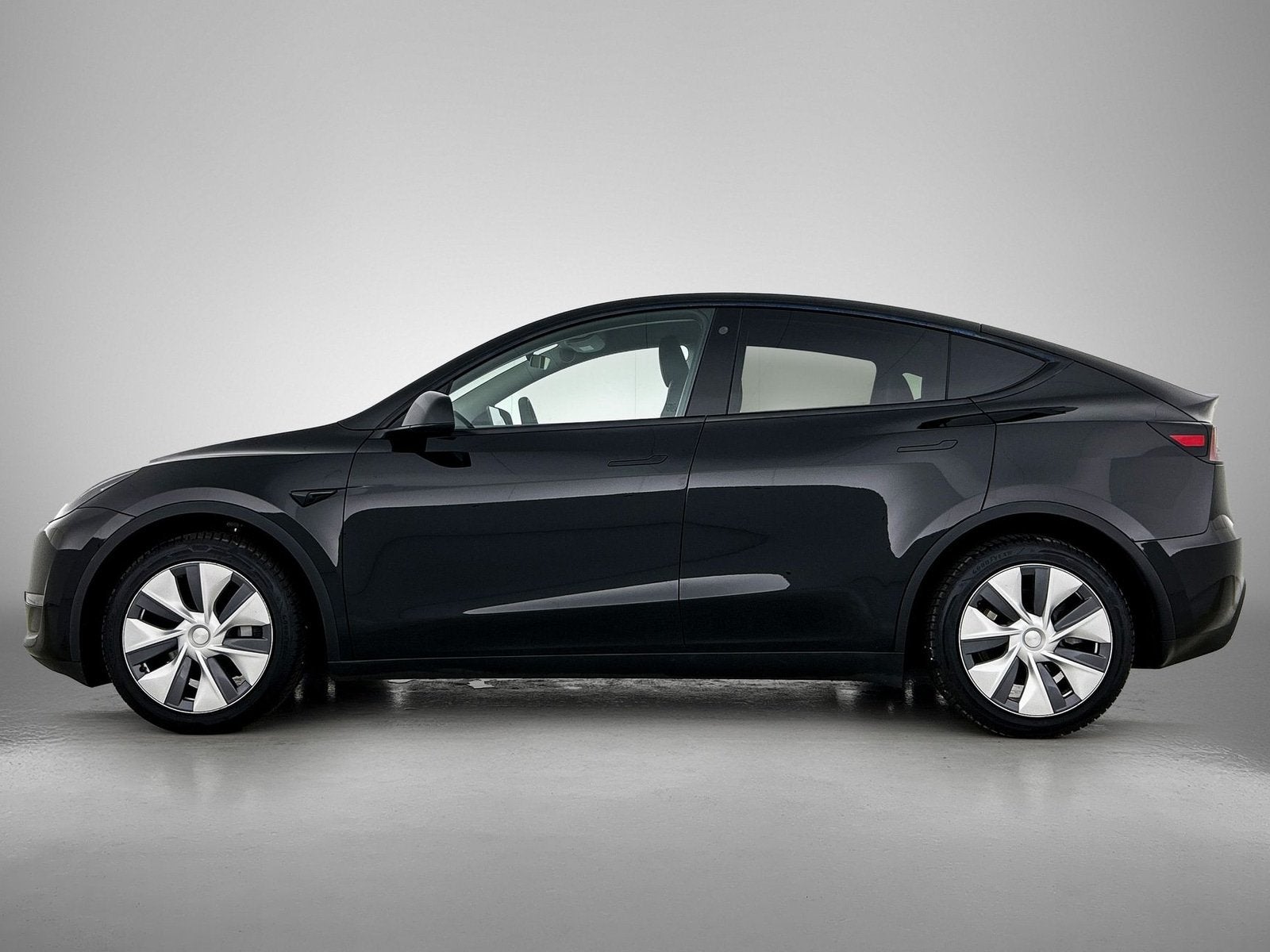 Tesla Model Y Long Range AWD 75 kWh (bj 2024, automaat), Auto's, Tesla, Gebruikt, Zwart, Stoelverwarming, Zwart