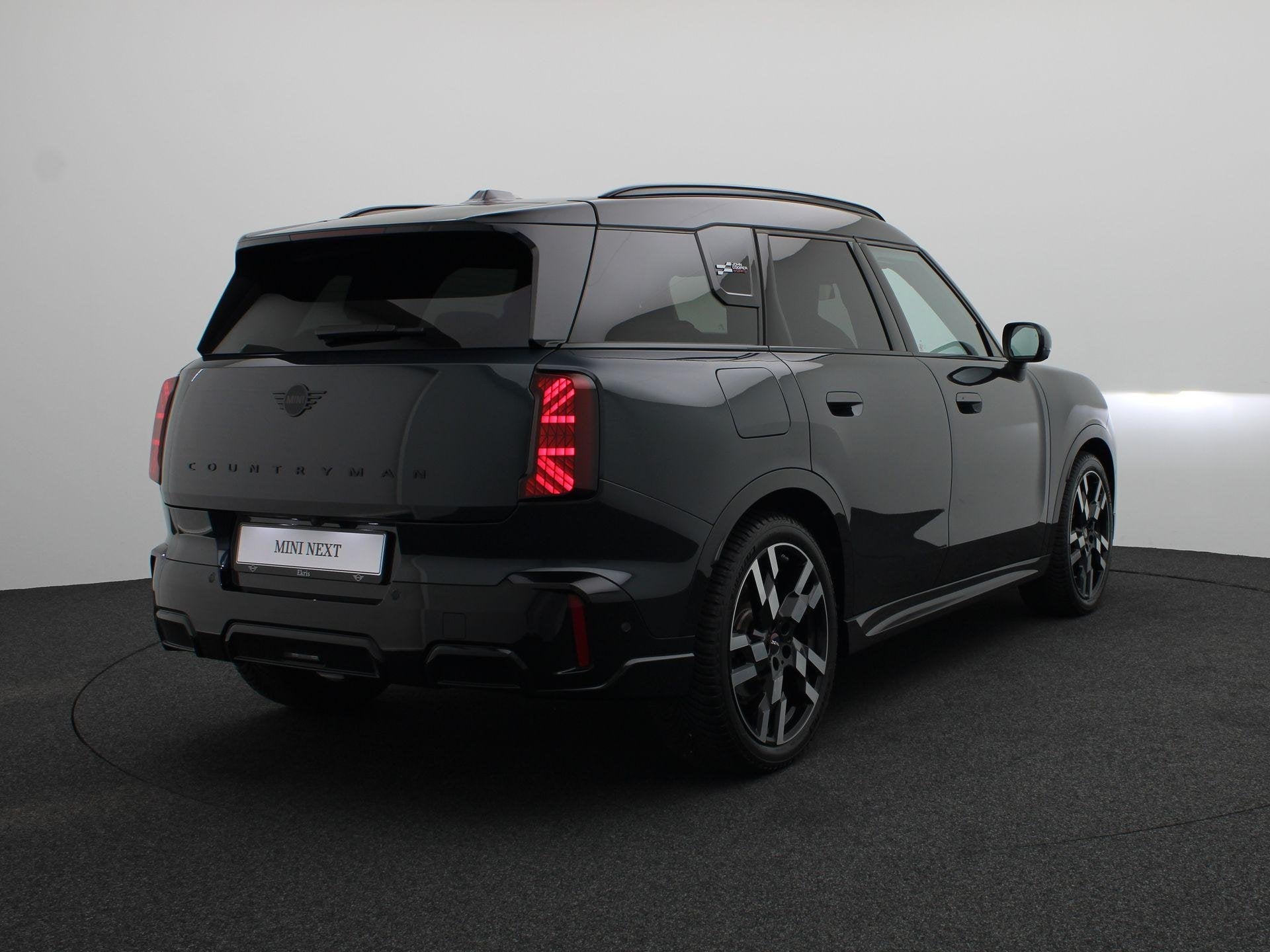 MINI Countryman E JCW Pakket + Pakket XL + Glazen panoramada, Auto's, Gebruikt, Countryman, Met garantie (alle), 204 pk