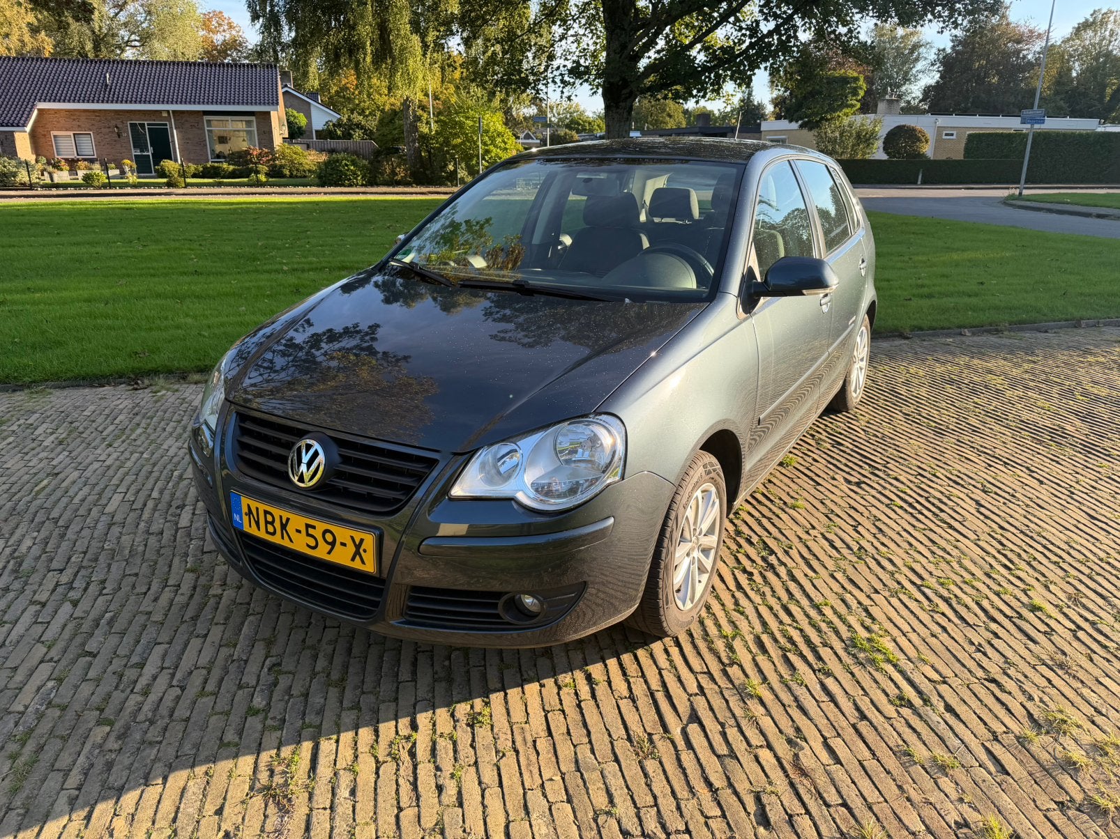 Volkswagen Polo 1.4 16V 59KW 2009 Grijs, Voorwielaandrijving, Stof, Elektrische ramen, Bedrijf