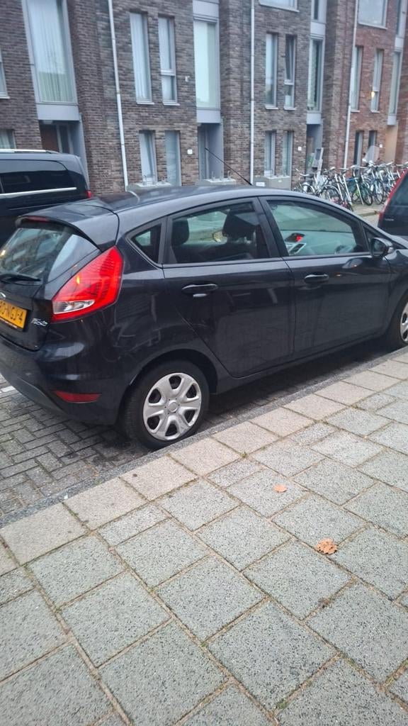 Ford Fiësta 1.25 44KW 5DR 2010 Zwart, Auto's, Ford, Voorwielaandrijving, 40 €/maand, 1242 cc, 4 cilinders
