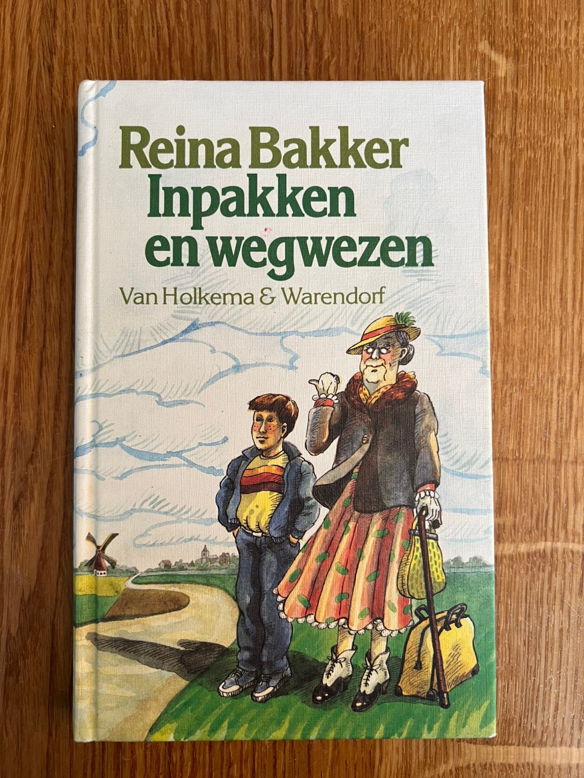 Inpakken en wegwezen - Reina Bakker, Ophalen of Verzenden, Zo goed als nieuw, Fictie algemeen