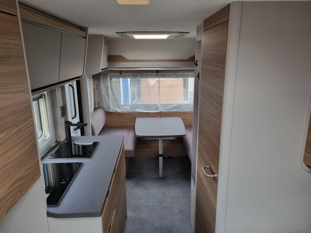Dethleffs Nomad 460 EL First Edition, Caravans en Kamperen, Caravans, Standaardzit, Schokbreker, Bedrijf, Tot en met 3