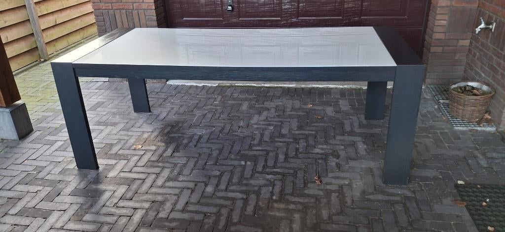 Te koop: zwart met witte (glas) eettafel merk Hulsta, Huis en Inrichting, Ophalen, Gebruikt, Glas, 200 cm of meer