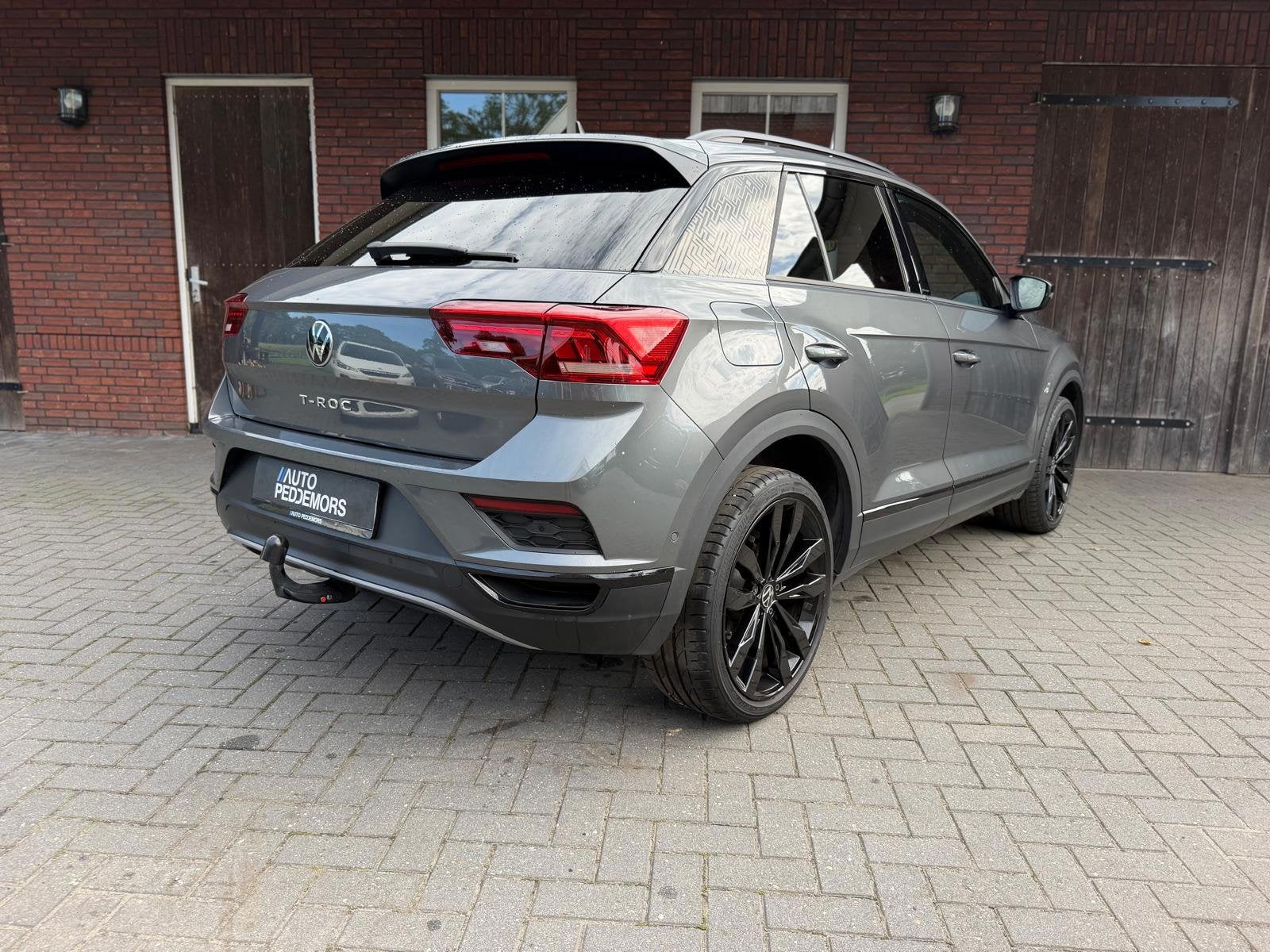 Volkswagen T-Roc 1.5 TSI Sport |Trekhaak| LED| ACC| Blindspo, Auto's, 4 cilinders, 150 pk, Leder en Stof, Bedrijf