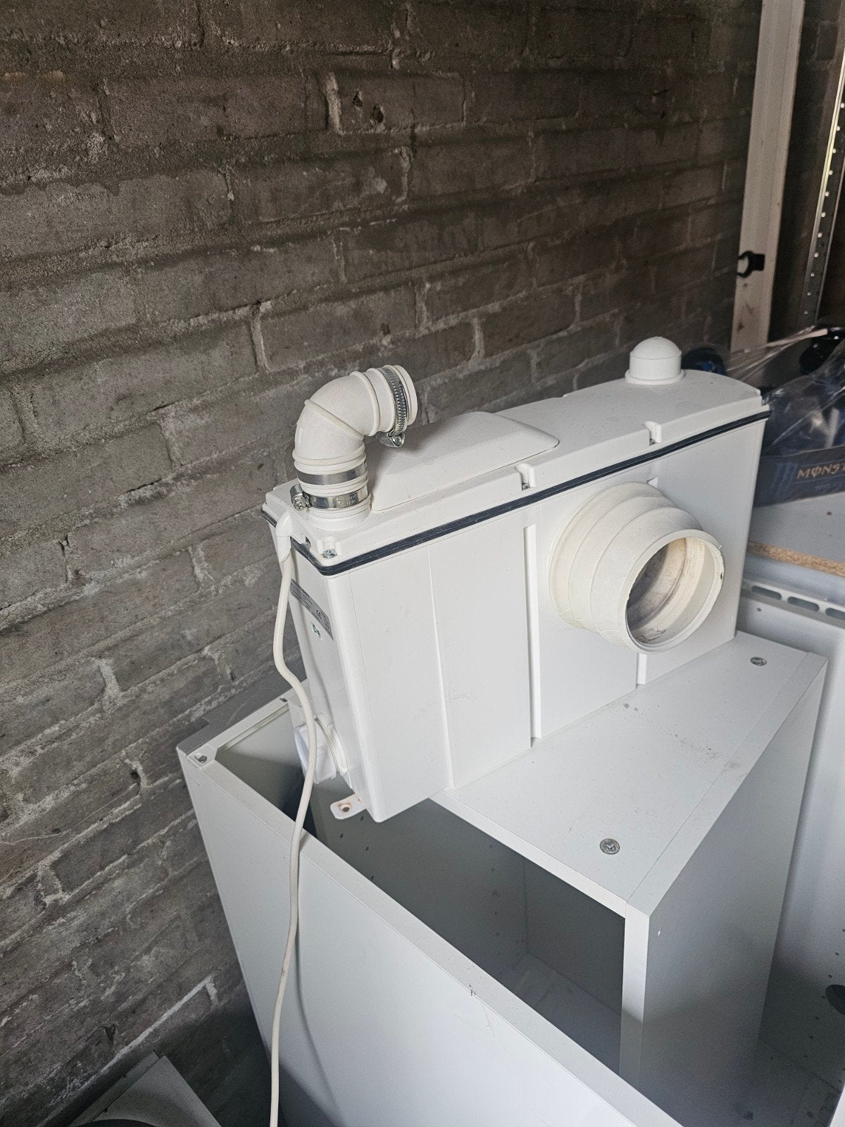 Sanibroyeur C met nieuwe printplaat, Ophalen