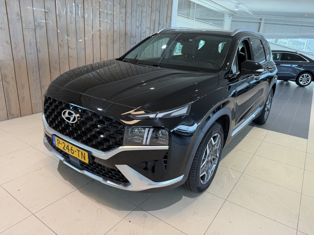 Hyundai Santa Fe 1.6 T-GDI HEV PrSky (bj 2022, automaat), Auto's, Hyundai, Automaat, Santa Fe, Gebruikt, Euro 6