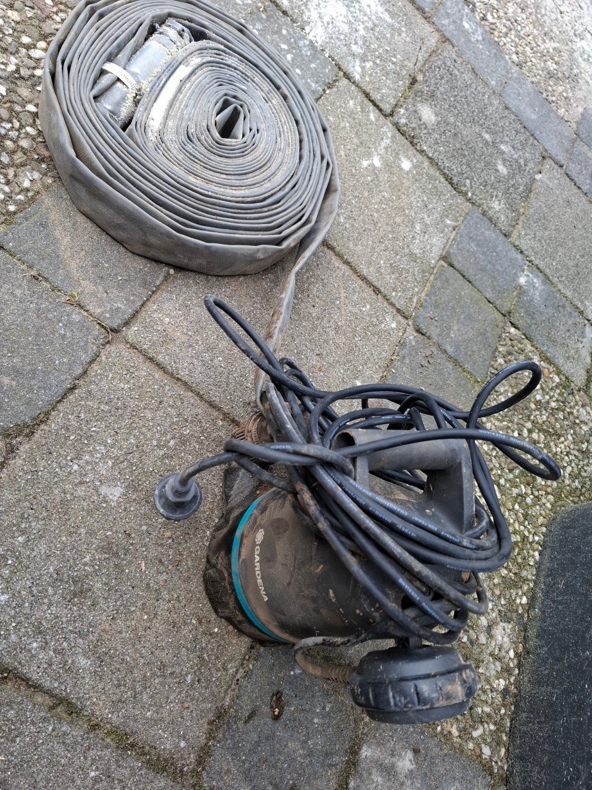Gardena dompelpomp te huur met extra lange slang, Ophalen of Verzenden