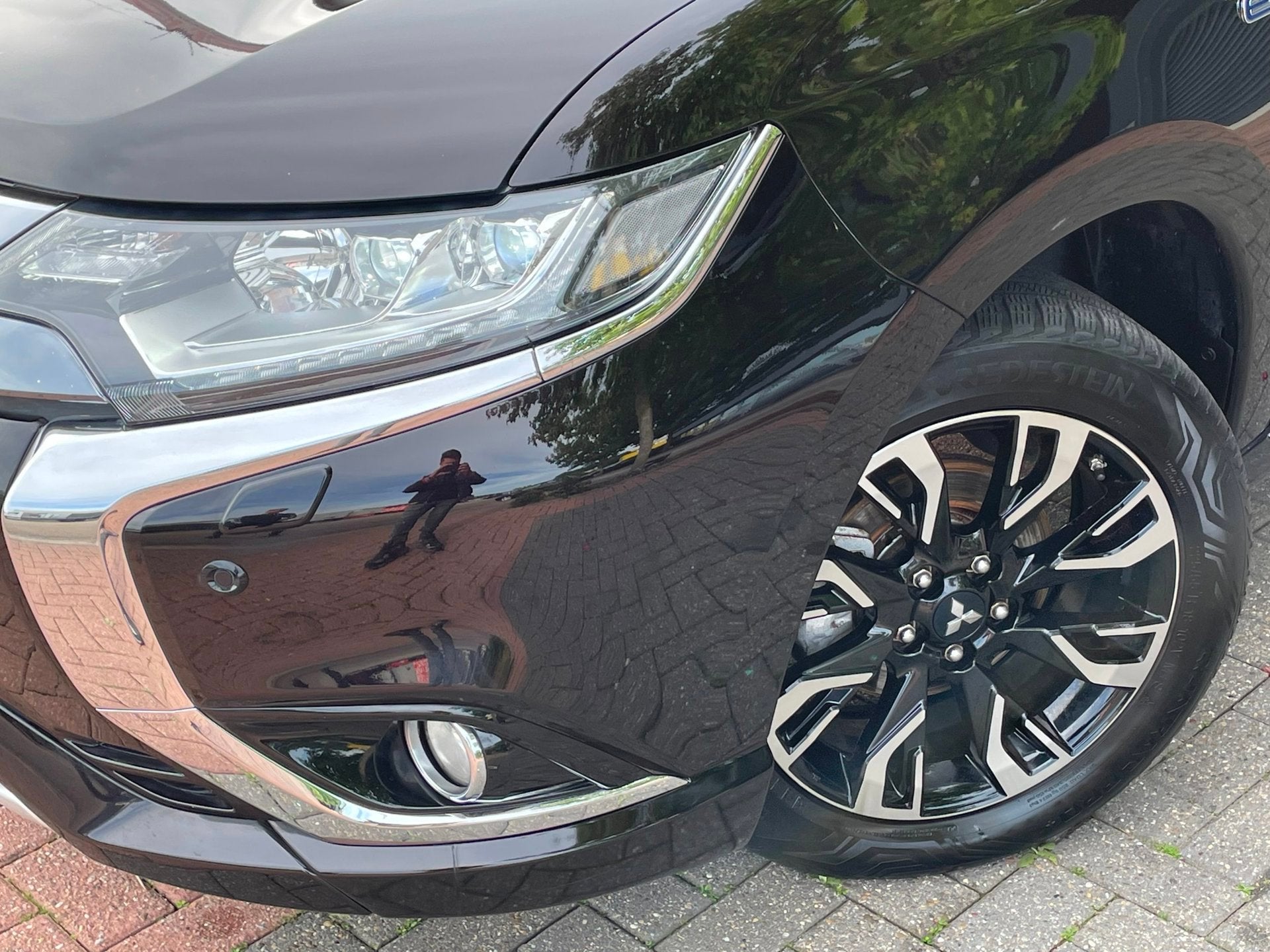 Mitsubishi Outlander 2.0 PHEV Instyle+ Schuifdak | Trekhaak, 4 cilinders, Verwarmde buitenspiegels, 1820 kg, Zwart