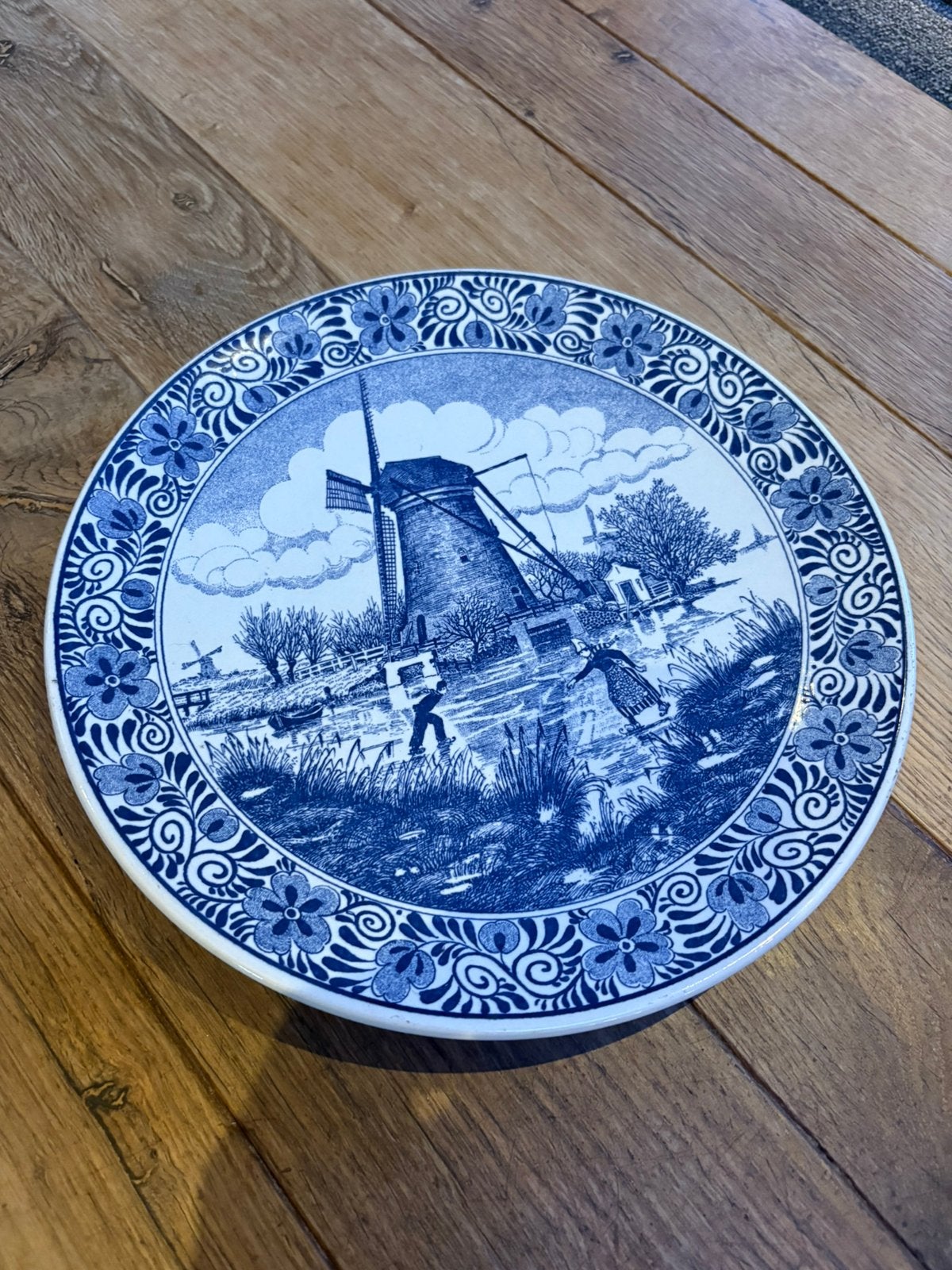 Delfts blauw wandbord, Ophalen
