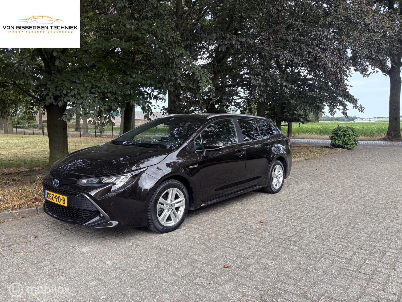 Toyota Corolla Touring Sports 1.8 Hybrid Business all in, Auto's, Toyota, Gebruikt, 4 cilinders, Bruin, Corolla