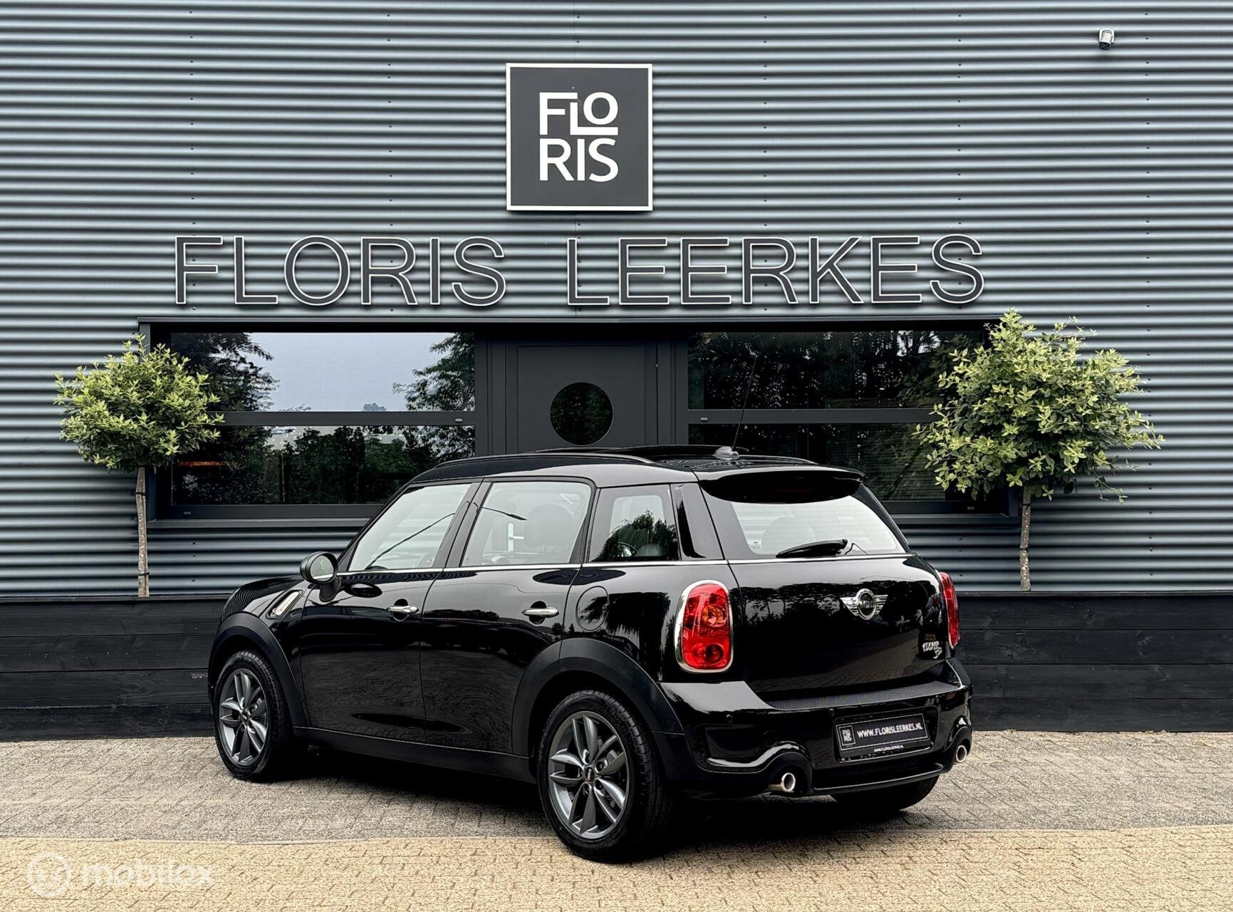 Mini Countryman 2.0 SD ALL4 | Pano dak | Xenon | Zwart Leer, Auto's, Automaat, Euro 5, Zwart, Leder