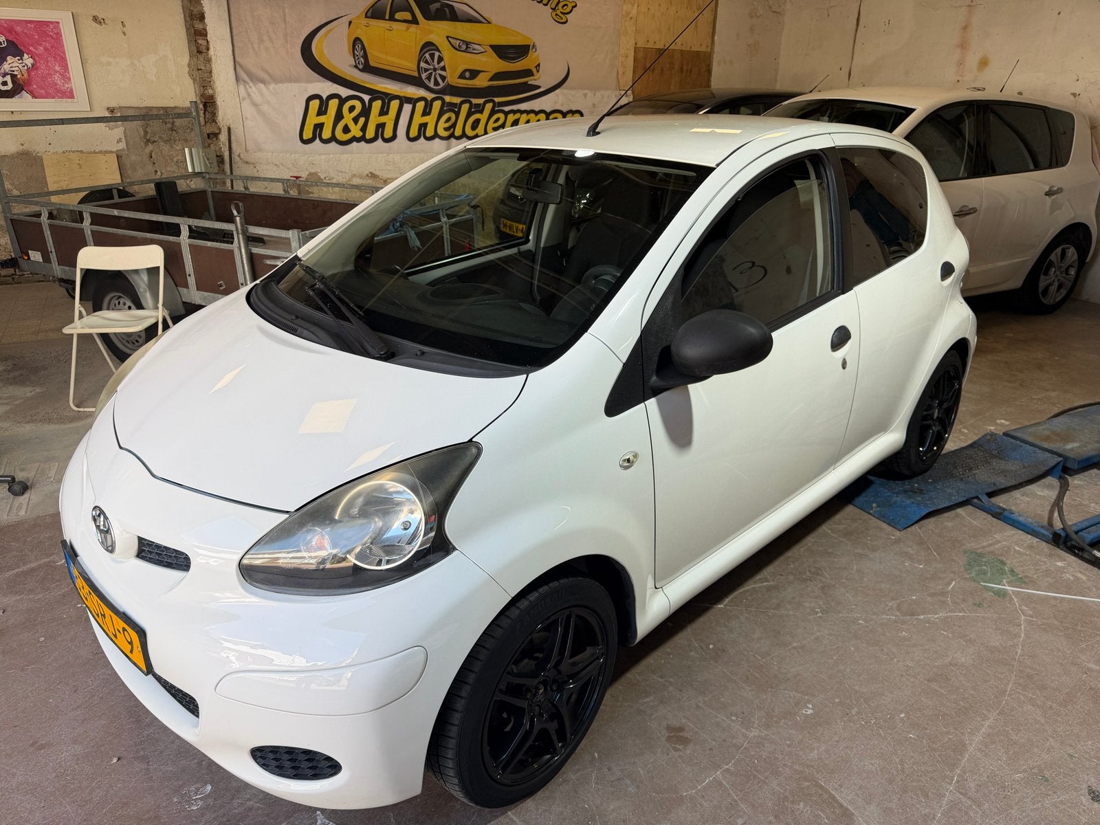 Toyota Aygo 1.0 12V Vvt-i 5DRS 2011 Wit, Voorwielaandrijving, Stof, Origineel Nederlands, Bedrijf