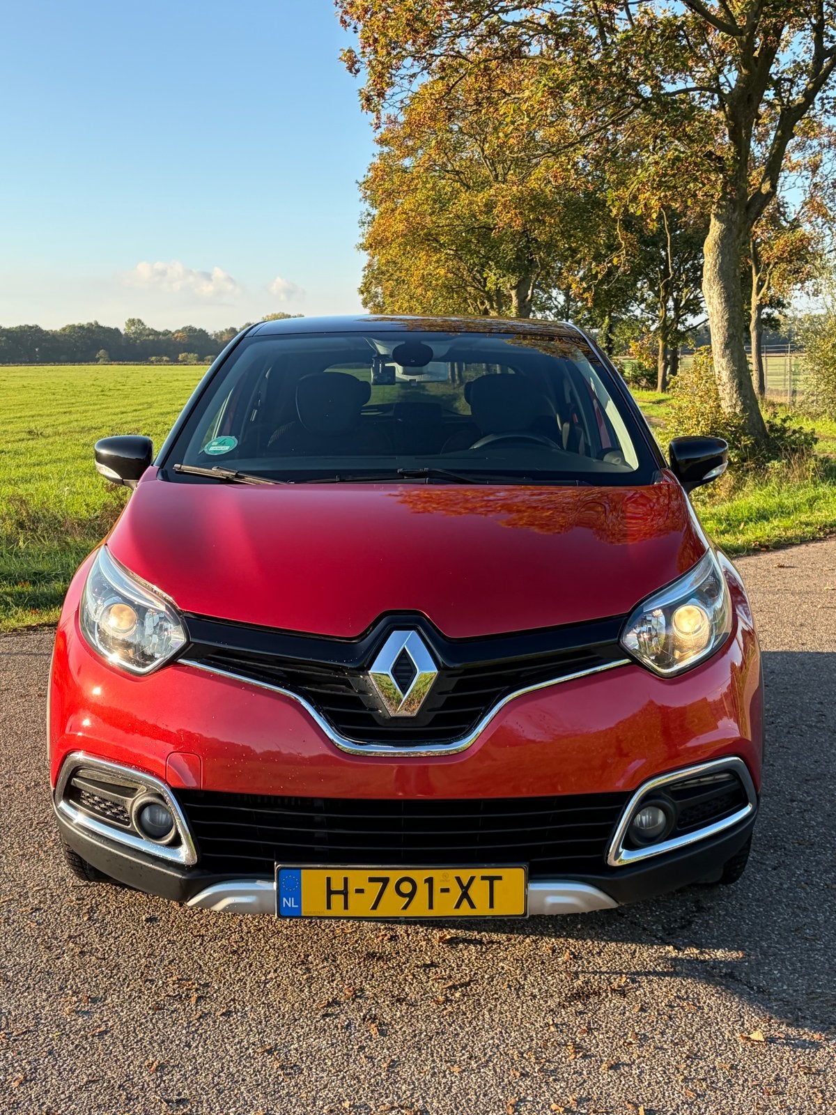 Renault Captur 0.9 TCE 90 2015 Rood Helly Hansen, Auto's, Voorwielaandrijving, 898 cc, Zwart, Leder en Stof