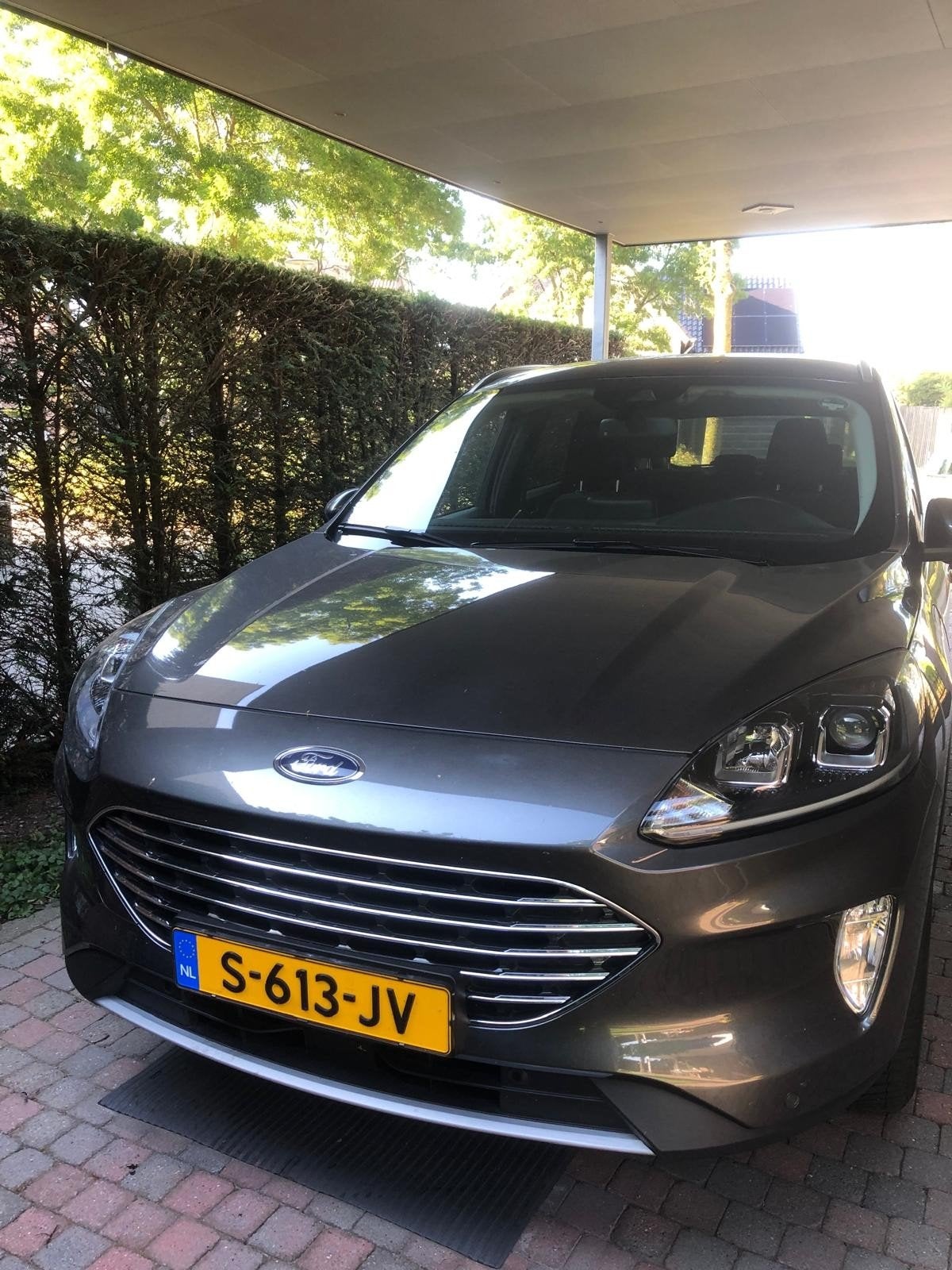 Ford Kuga 2.5 Phev E-cvt 225pk Titanium 2023 Grijs, Stof, Parkeersensor, 4 cilinders, Dealer onderhouden