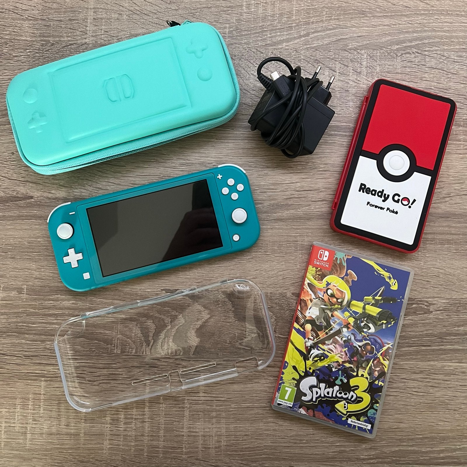 Nintendo Switch Lite Turquoise + Splatoon 3 & Accessoires, Spelcomputers en Games, Ophalen of Verzenden, Turquoise, Zo goed als nieuw