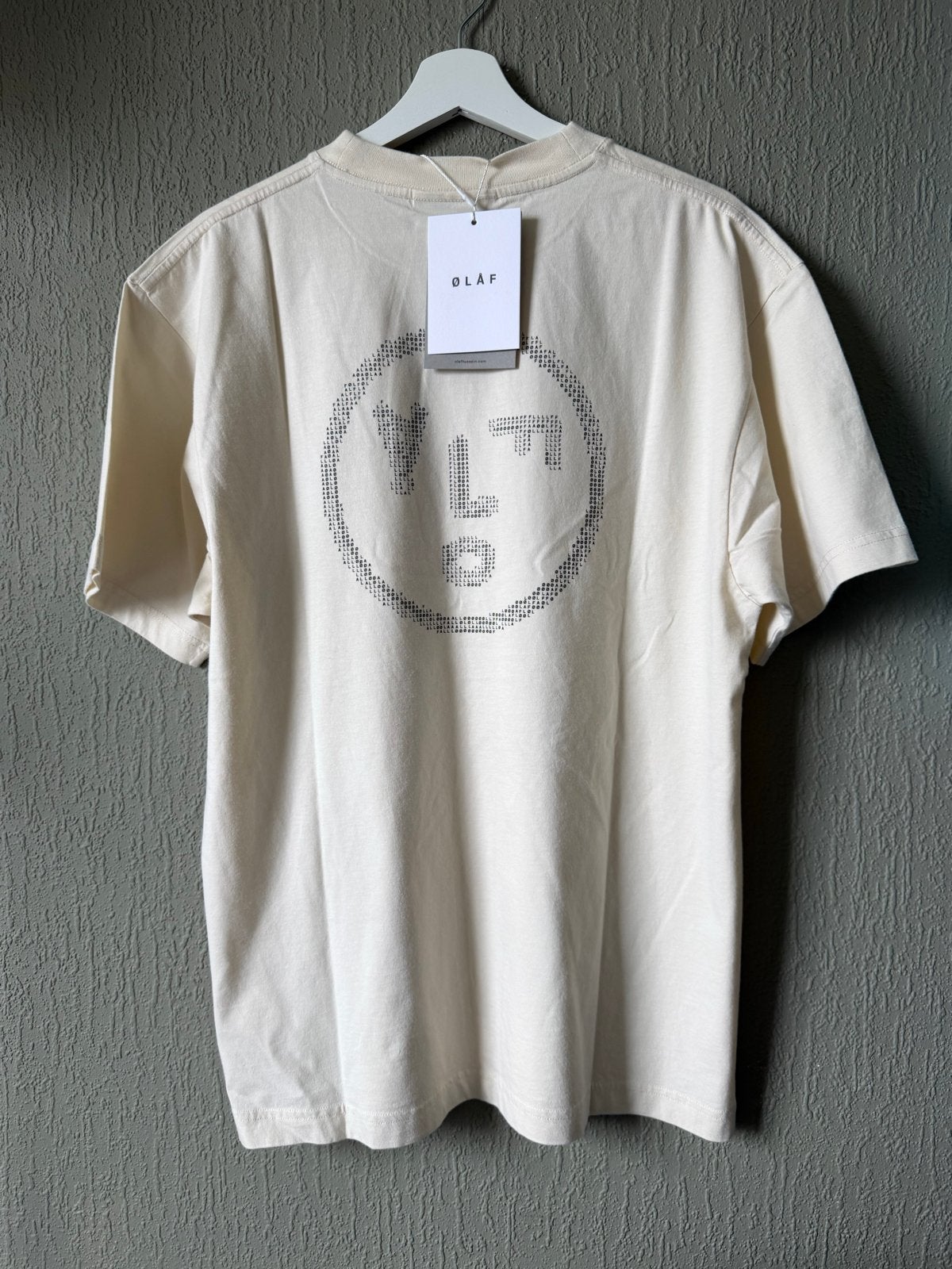 Olaf Hussein Face Logo T-shirt maat m, Ophalen of Verzenden, Nieuw, Maat 48/50 (M), Beige
