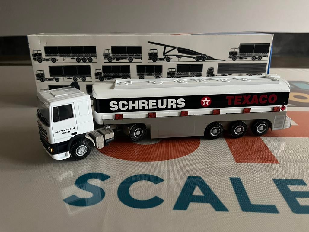 DAF vrachtwagen met tankoplegger Schreurs Texaco Lion Toys, Hobby en Vrije tijd, Modelauto's | 1:50, Ophalen of Verzenden, Zo goed als nieuw