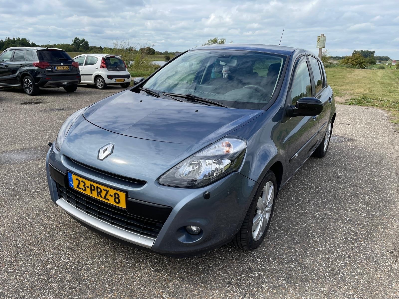 Renault Clio 1.6 16V 5-DRS AUT 20th Anniversary 2011 Blauw, Auto's, 4 cilinders, 1165 kg, Blauw, Origineel Nederlands
