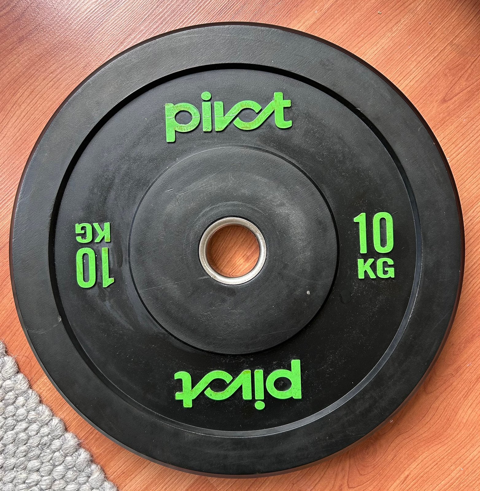 Pivot Bumper plate set 10 kg., Ophalen, Zo goed als nieuw