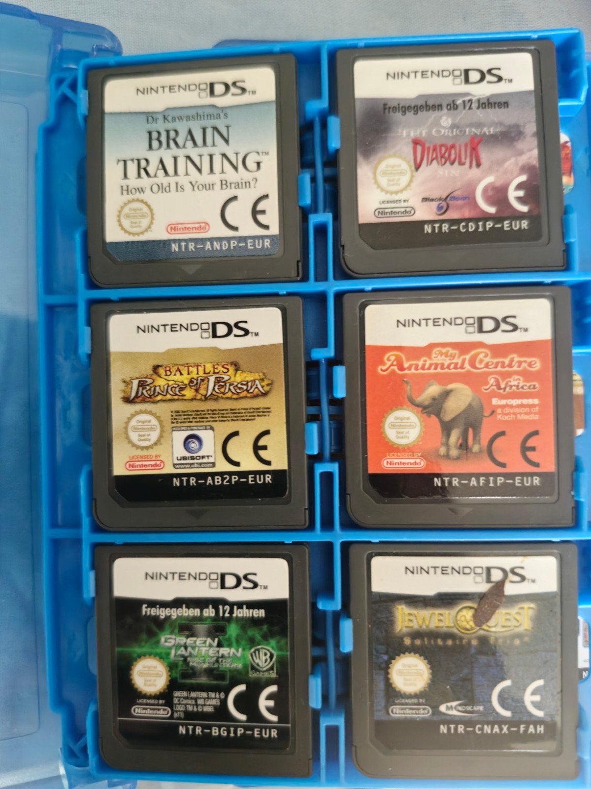 18 games zie foto 1 koop in blauw hoesje erbij, Spelcomputers en Games, 1 speler, Ophalen, Zo goed als nieuw, Vanaf 7 jaar