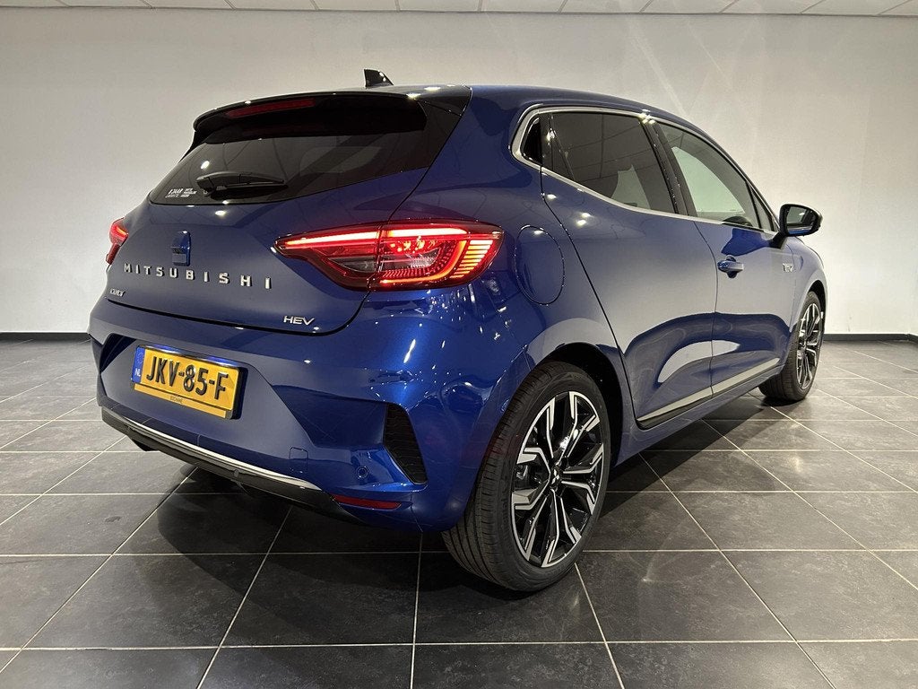Mitsubishi Colt 1.6 HEV Intense+ | DEMO |, Auto's, Mitsubishi, Blauw, Leder en Stof, Colt, Origineel Nederlands