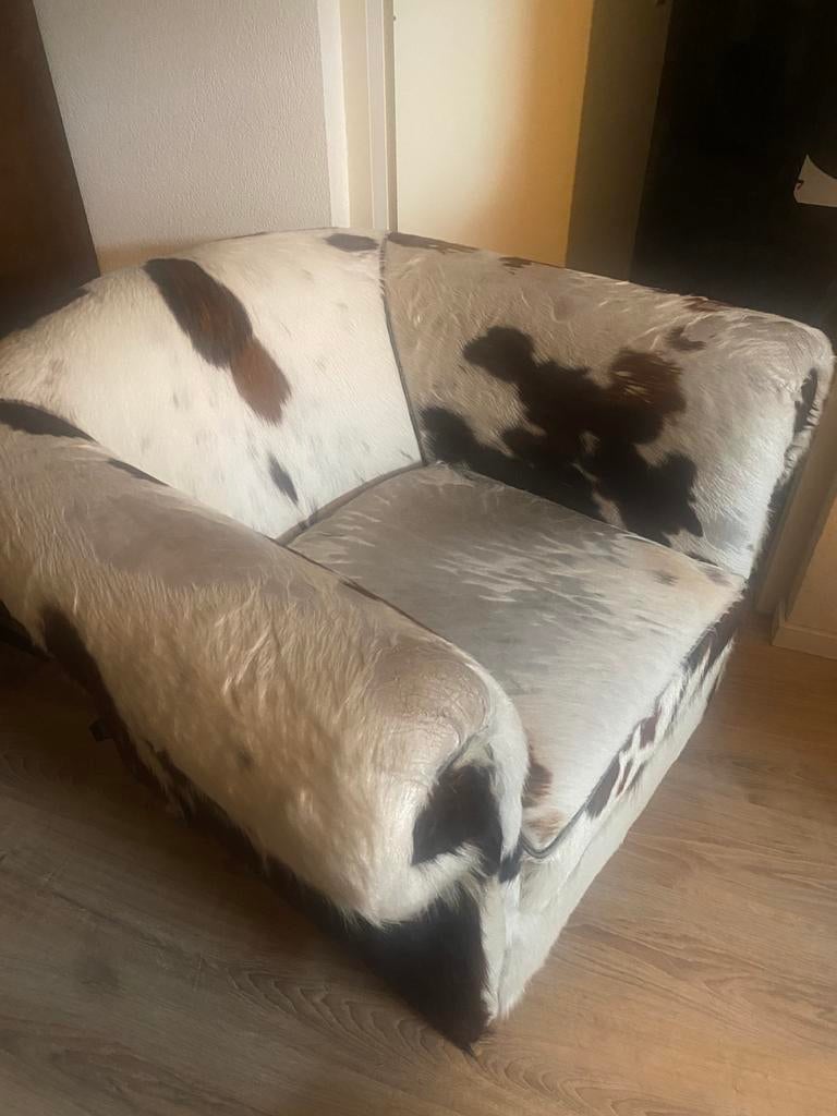 Koeienhuid fauteuil stoel 125 euro!, Huis en Inrichting, Ophalen, Overige materialen, Gebruikt, 75 tot 100 cm