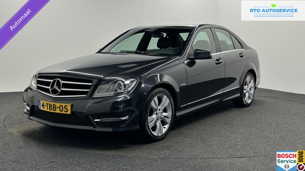 Mercedes-Benz C-klasse 180 Ambition Avantgarde AMG XENON TRE, Achterwielaandrijving, Met garantie (alle), Zwart, Sedan