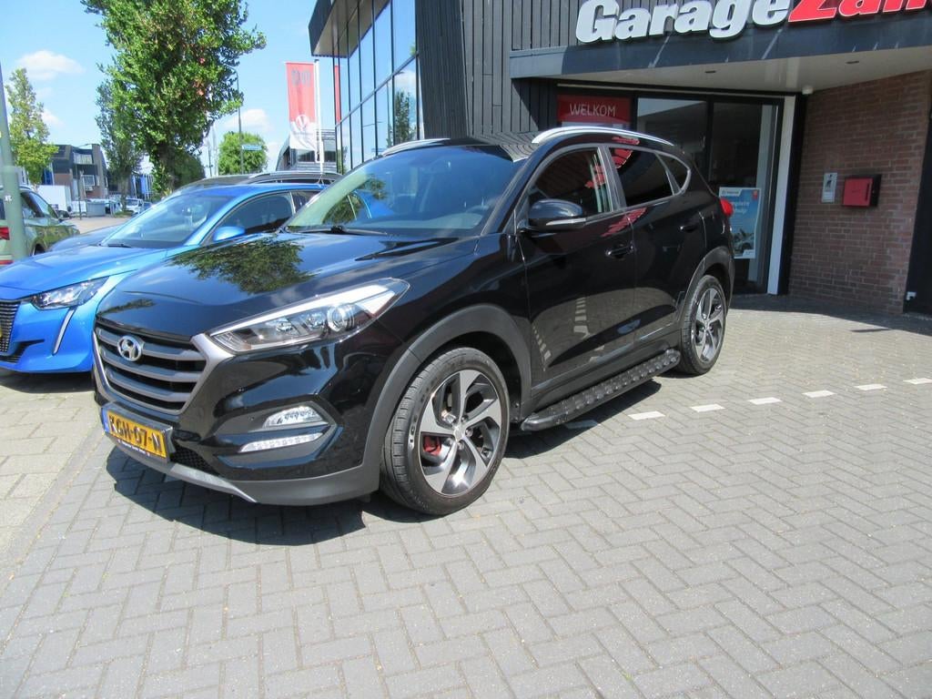 Hyundai TUCSON 1.6 T-GDi Comfort 4WD, Auto's, Hyundai, Gebruikt, 4 cilinders, Leder en Stof, Zwart