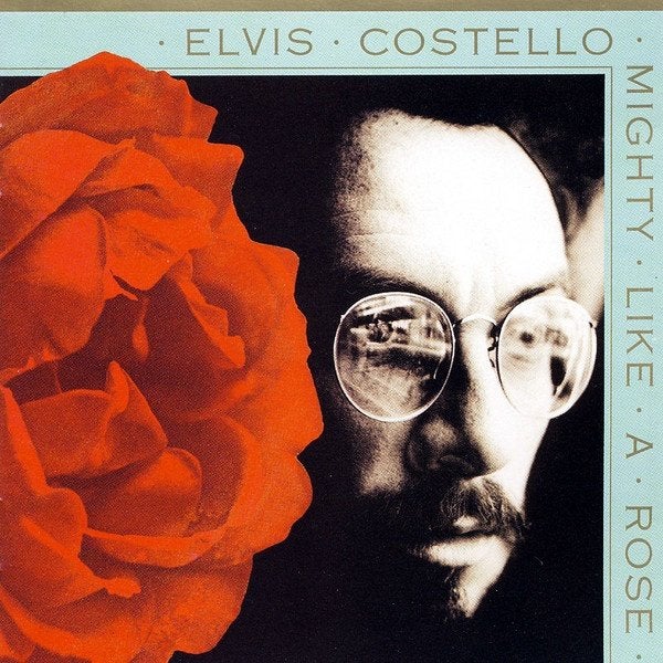 Folk Rock C.D. (1991) Elvis Costello - Mighty like a Rose., Inclusief boekje, Singer-songwriter, Gebruikt, Ophalen of Verzenden