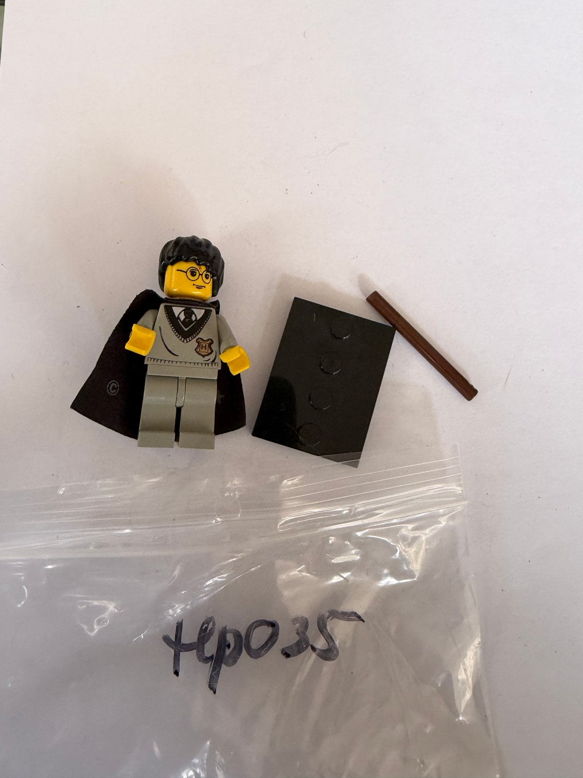 Lego Harry Potter Minifiguur HP035 met toverstokje en boek, Kinderen en Baby's, Ophalen of Verzenden, Gebruikt, Overige merken