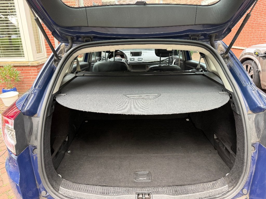 Foto 23 van Renault Mégane 1.5 DCI 81KW Estate 2012 met winterbanden