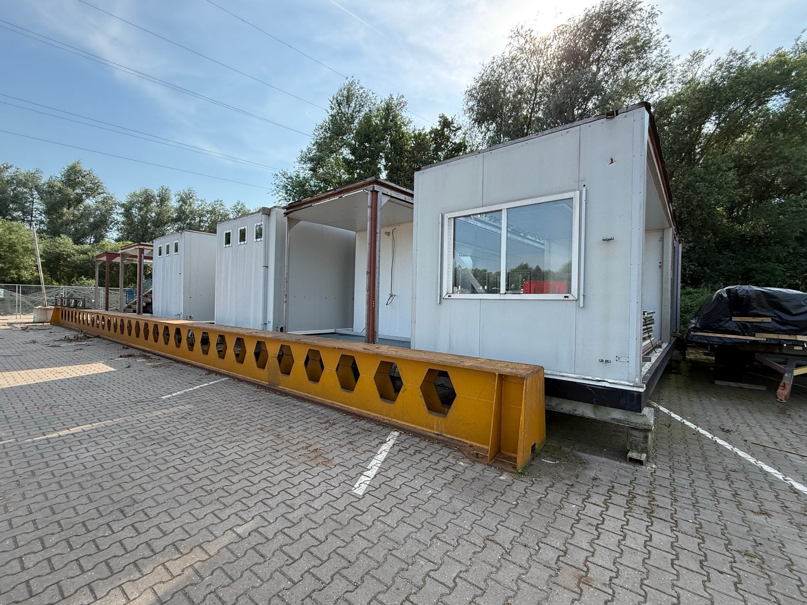 Modulaire kantoorunits en sanitair units, Ophalen